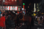 The police on Broadway Avenue. The horse is still practical considering the number of people