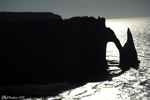 Etretat - Sunset on the aiguille creuse, Etretat. The last rays of sunlight make this cutout beautiful