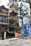 Bangalore - Electricity blocks almost touching the houses